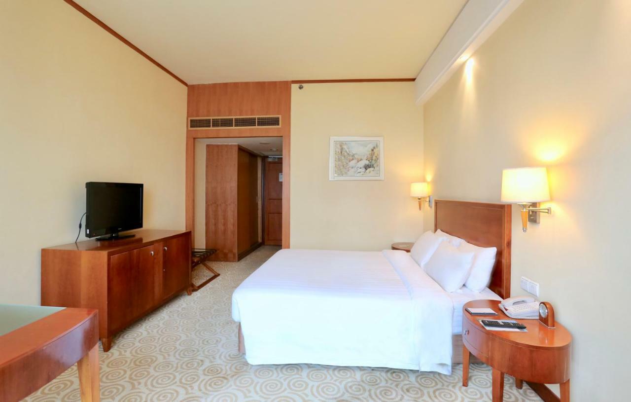 Hotel Equatorial Csingtao Szoba fotó